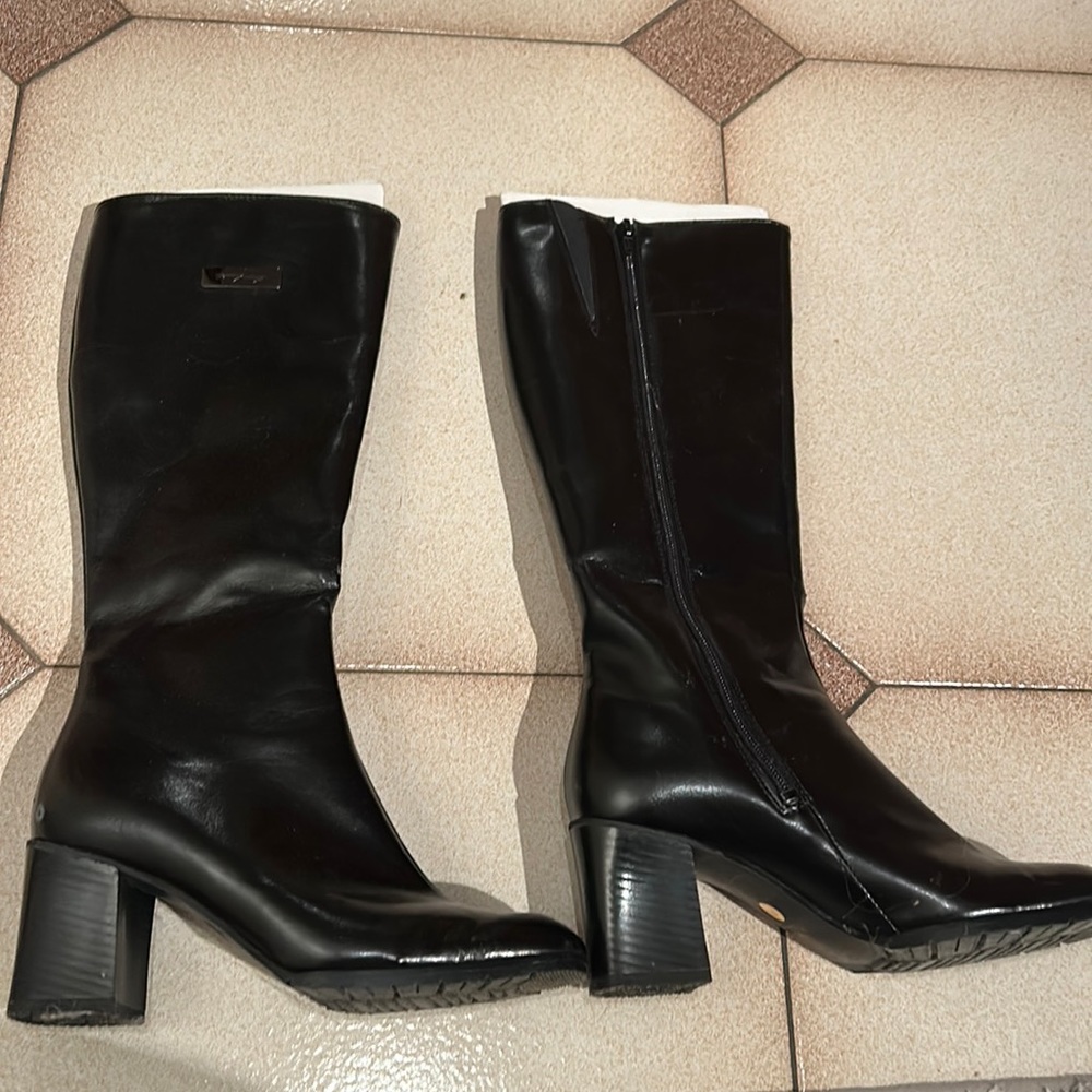 HEELED PALMROTH LEATHER BOOTS